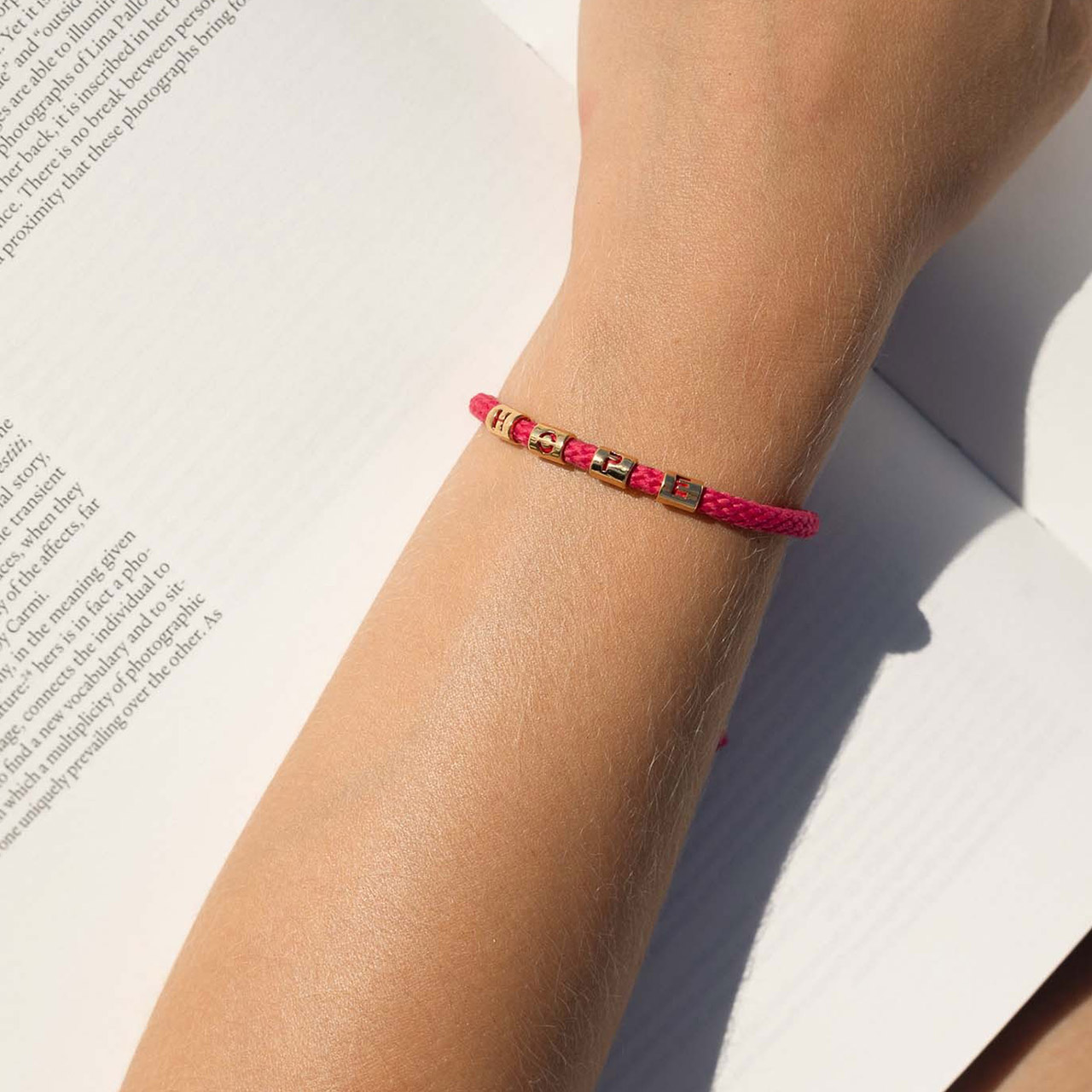 Buchstabenarmband HOPE vergoldet rosa